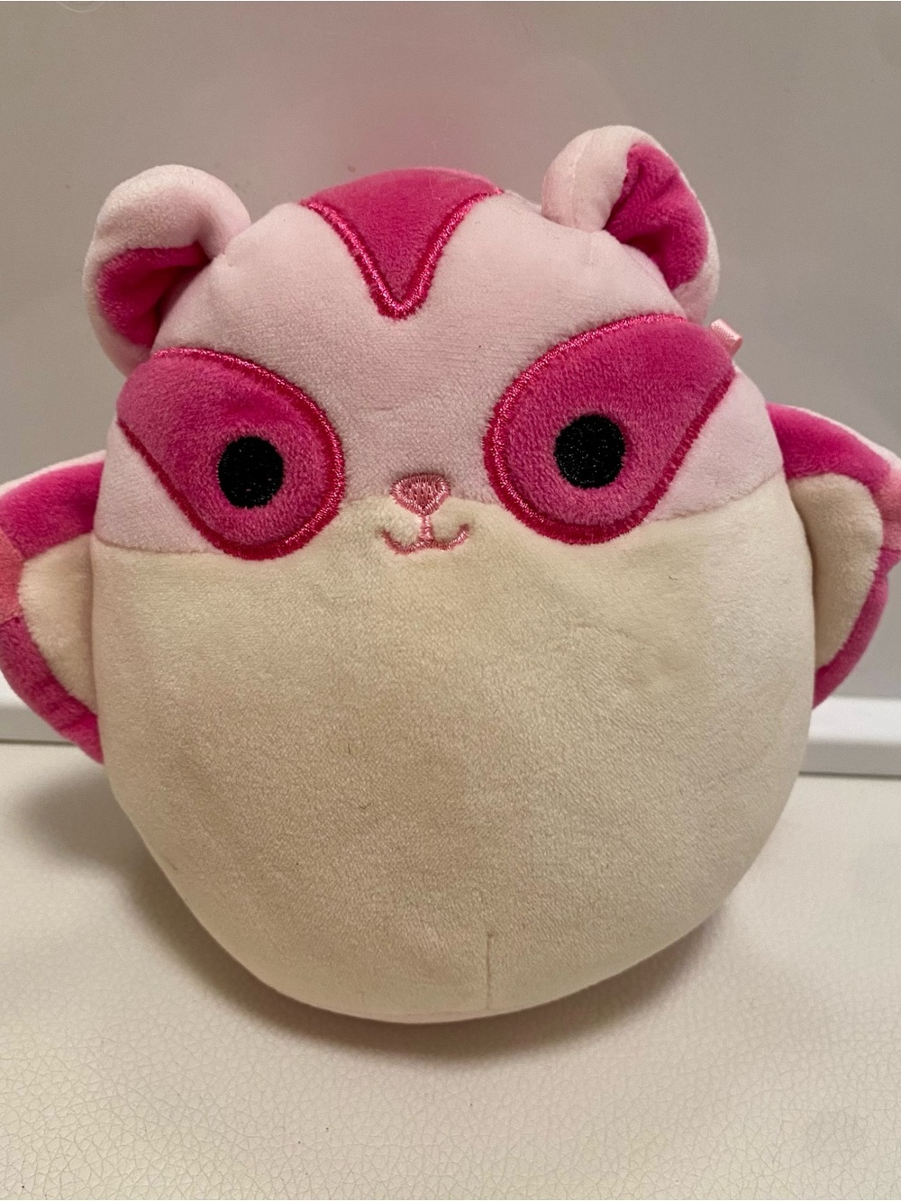 Squishmallows pink and white raccoon - small